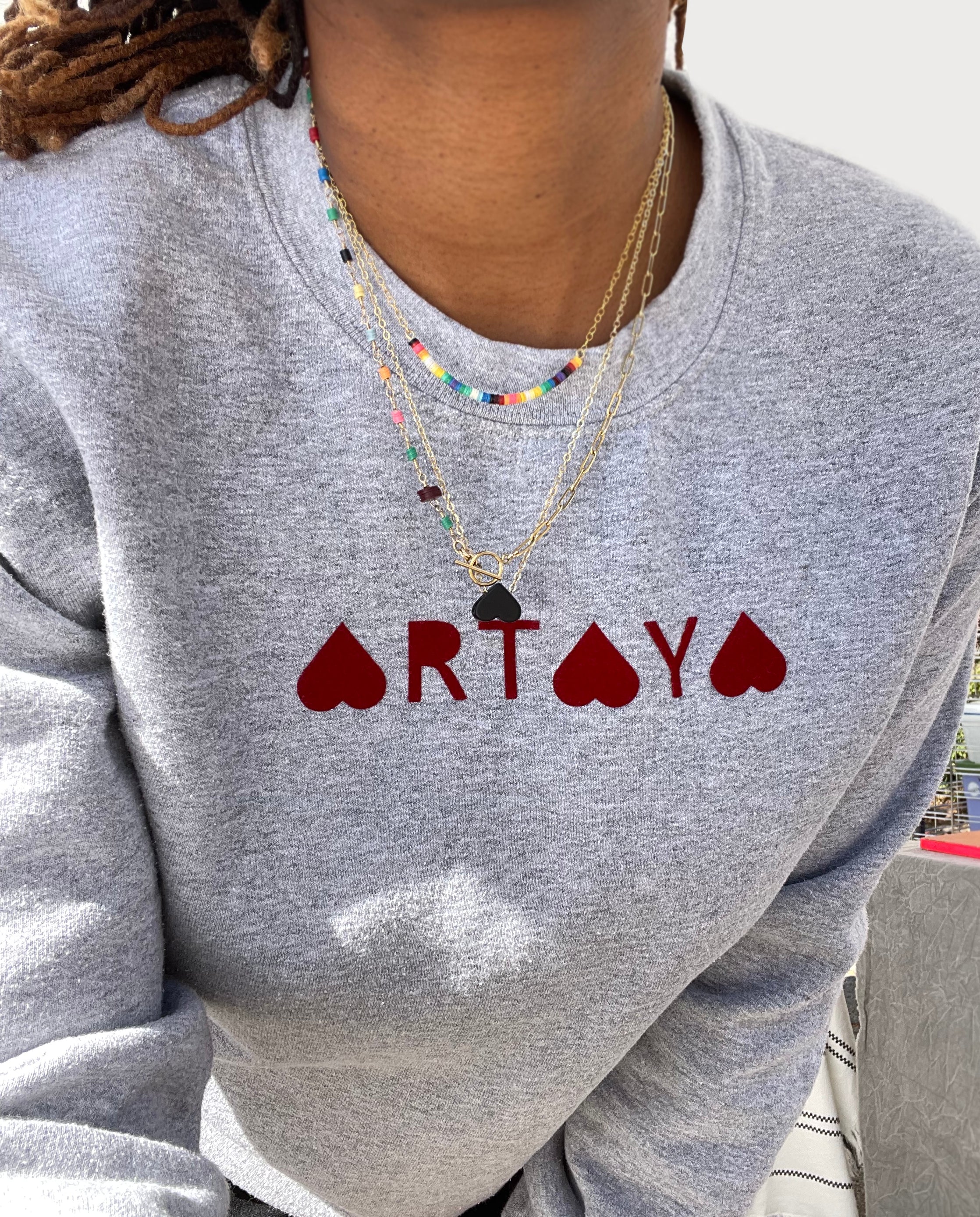 Sweatshirt with heart store logo